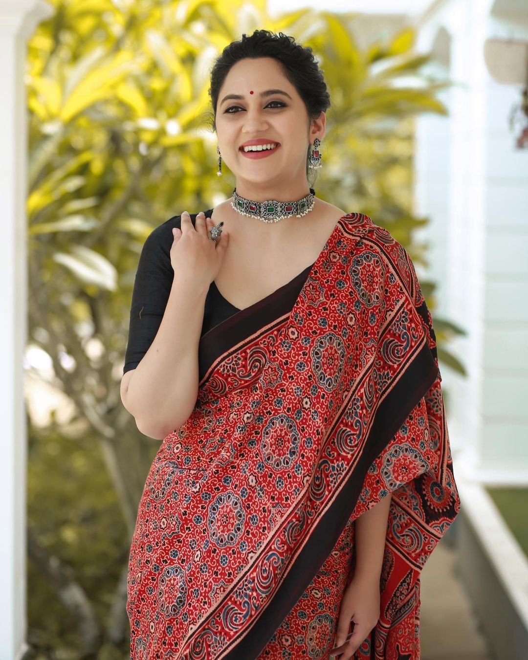 Malayalam Actress Miya George Images in Maroon Saree Black Blouse